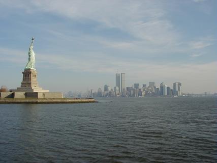 Statue of Liberty and New York City<br>Location: <a href="https://www.google.com/maps/search/?api=1&query=40.68773,-74.04756" target="_new">Liberty Island Ferry</a>
